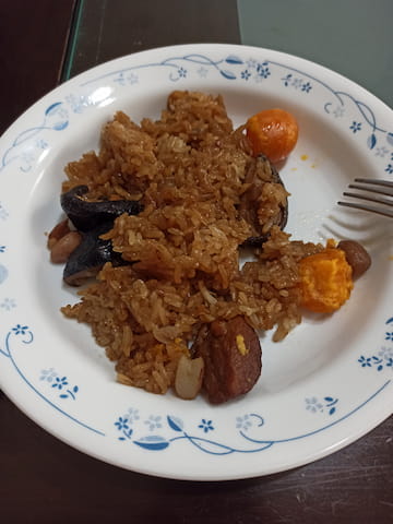 攤平變成油飯的粽子